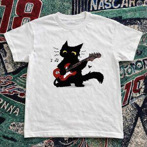 Black cat playing a red electric guitar